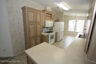 318 Macadamia Dr, Barefoot Bay, FL 32976 - Photo 9