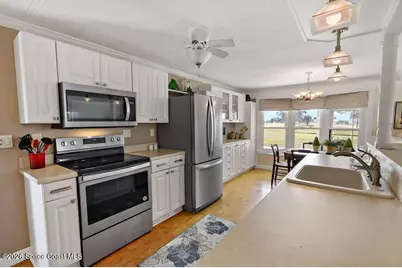 1043 Royal Palm Drive, Barefoot Bay, FL 32976 - Photo 7