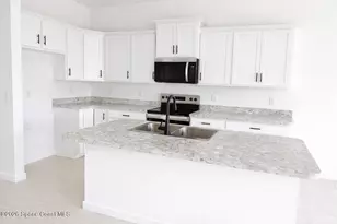 1048 Soleway Ave NW, Palm Bay, FL 32907 - Photo 3