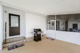 914 Hyacinth Cir, Barefoot Bay, FL 32976 - Photo 35