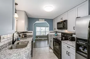 914 Hyacinth Cir, Barefoot Bay, FL 32976 - Photo 11