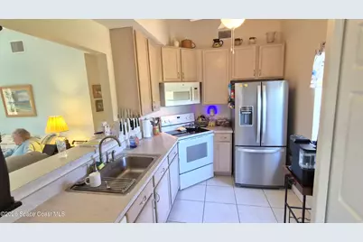 4931 Lake Waterford Way W #3-202, Melbourne, FL 32901 - Photo 7