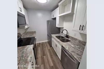 3585 Sable Palm Lane #E, Titusville, FL 32780 - Photo 5