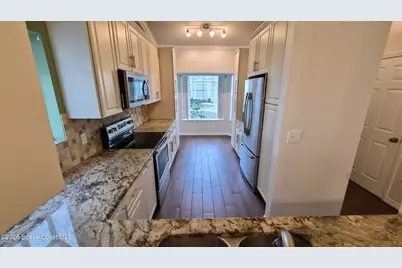 4948 Lake Waterford Way W #203-2, Melbourne, FL 32901 - Photo 3