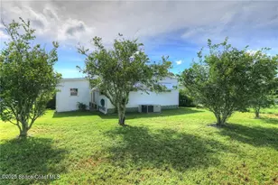 912 Oriole Cir, Barefoot Bay, FL 32976 - Photo 3