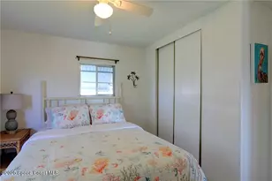 912 Oriole Cir, Barefoot Bay, FL 32976 - Photo 11