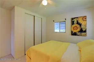 912 Oriole Cir, Barefoot Bay, FL 32976 - Photo 15