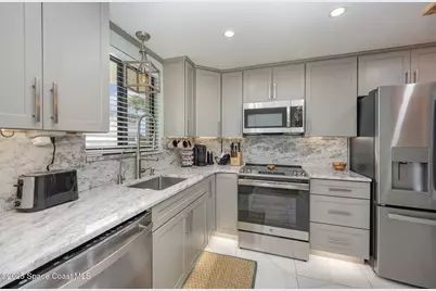 7101 Ridgewood Avenue #102, Cape Canaveral, FL 32920 - Photo 3