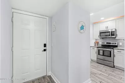 1010 Pinetree Drive #102, Indian Harbour Beach, FL 32937 - Photo 3