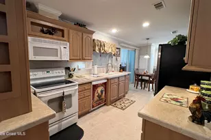 621 Puffin Dr, Barefoot Bay, FL 32976 - Photo 11