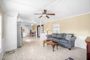 358 Dolphin Cir, Barefoot Bay, FL 32976 - Photo 9