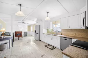 358 Dolphin Cir, Barefoot Bay, FL 32976 - Photo 13