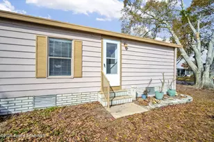 358 Dolphin Cir, Barefoot Bay, FL 32976 - Photo 25