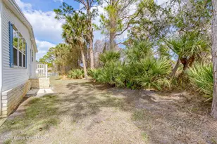 859 Tamarind Cir, Barefoot Bay, FL 32976 - Photo 31