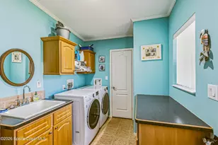 859 Tamarind Cir, Barefoot Bay, FL 32976 - Photo 25