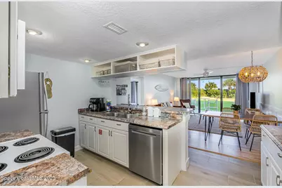 7400 Ridgewood Avenue #102, Cape Canaveral, FL 32920 - Photo 9