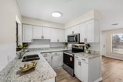 1014 Illinois Road, Port Saint John, FL 32927 - Photo 7