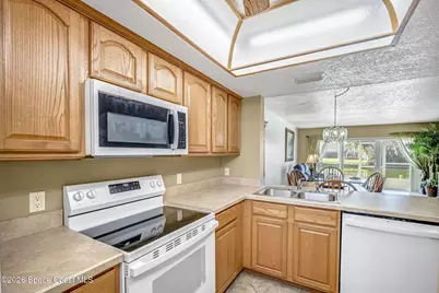 1595 N Atlantic Avenue #110, Cocoa Beach, FL 32931 - Photo 7