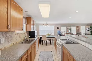 1027 Oriole Cir, Barefoot Bay, FL 32976 - Photo 3