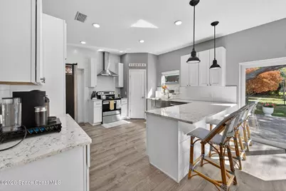 1046 N Tropical Trail, Merritt Island, FL 32953 - Photo 17