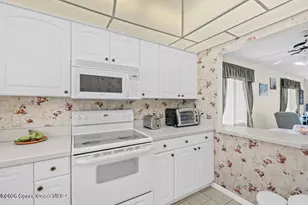 201 St Lucie Ln, Cocoa Beach, FL 32931 - Photo 7