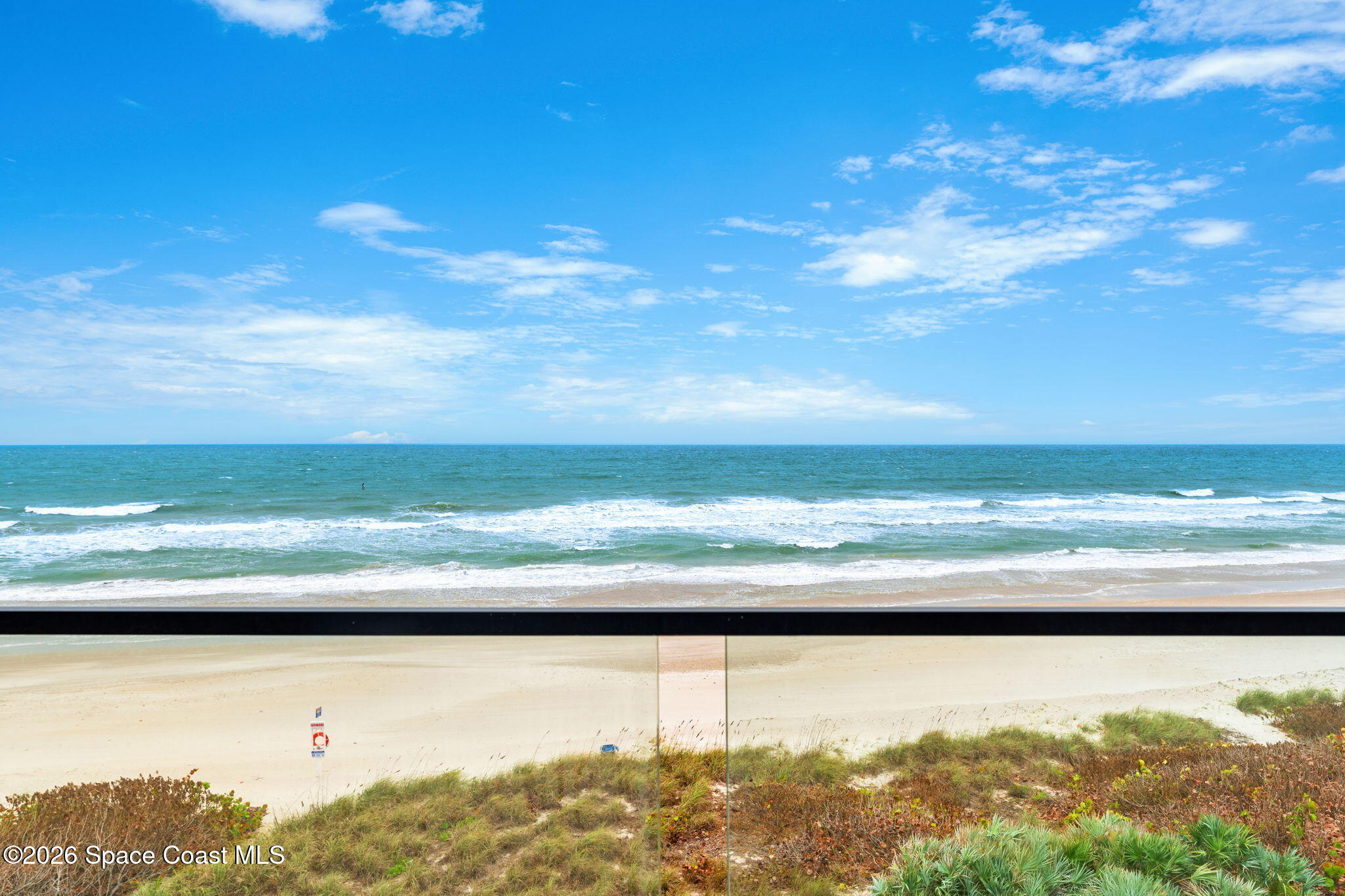 Wide, quiet white-sand beach and turquoise Atlantic surf directly in front of the residence