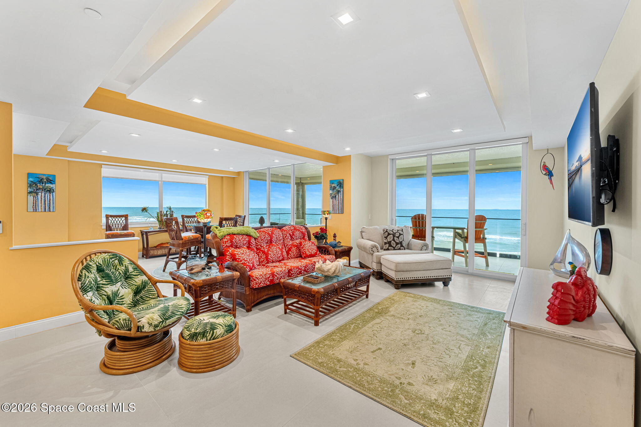 Great room with ocean-facing windows and open-plan living