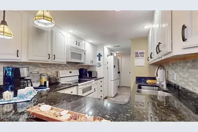 8711 Hibiscus Court, Cape Canaveral, FL 32920 - Photo 17