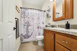 1067 Wren Cir, Barefoot Bay, FL 32976 - Photo 11