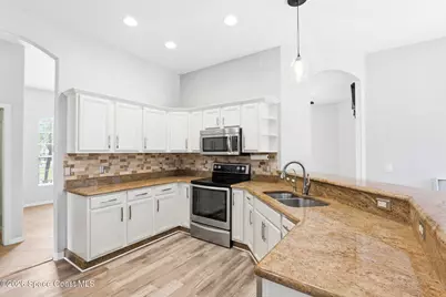 1661 Whitman Drive, Melbourne, FL 32904 - Photo 23