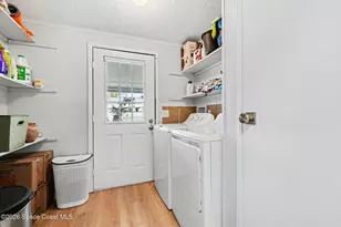 614 Hyacinth Cir, Barefoot Bay, FL 32976 - Photo 21