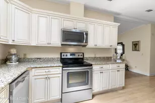 624 Wedelia Dr, Barefoot Bay, FL 32976 - Photo 11