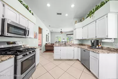 1044 Harbor Pines Drive, Merritt Island, FL 32952 - Photo 17