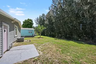 421 Papaya Cir, Barefoot Bay, FL 32976 - Photo 23