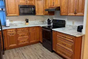 706 Hyacinth Cir, Barefoot Bay, FL 32976 - Photo 5