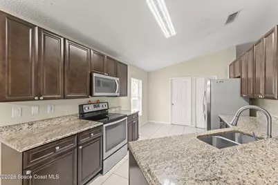 4481 Derbyshire Drive, Titusville, FL 32780 - Photo 11