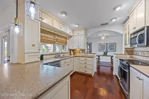 1194 Bay Dr E, Indian Harbour Beach, FL 32937 - Photo 7