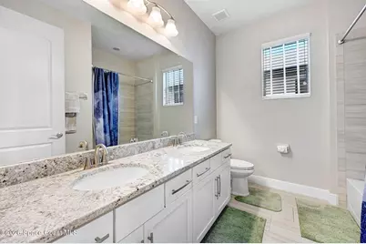 7506 Millbrook Avenue, Melbourne, FL 32940 - Photo 25