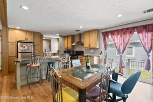 958 Pecan Cir, Barefoot Bay, FL 32976 - Photo 9