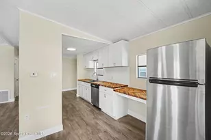 911 Hyacinth Cir, Barefoot Bay, FL 32976 - Photo 9