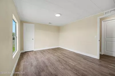 911 Hyacinth Circle, Barefoot Bay, FL 32976 - Photo 19
