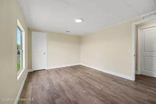911 Hyacinth Cir, Barefoot Bay, FL 32976 - Photo 19