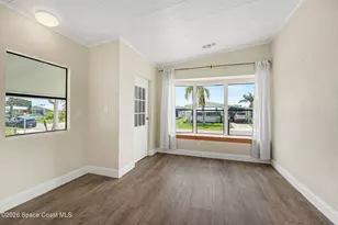 911 Hyacinth Cir, Barefoot Bay, FL 32976 - Photo 11