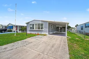 911 Hyacinth Cir, Barefoot Bay, FL 32976 - Photo 25