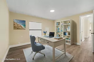 911 Hyacinth Cir, Barefoot Bay, FL 32976 - Photo 13