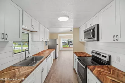 911 Hyacinth Circle, Barefoot Bay, FL 32976 - Photo 3