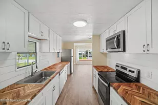 911 Hyacinth Cir, Barefoot Bay, FL 32976 - Photo 3