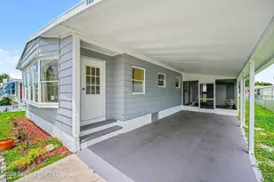 911 Hyacinth Cir, Barefoot Bay, FL 32976 - Photo 23