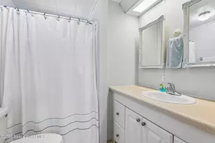 513 S Egret Cir, Barefoot Bay, FL 32976 - Photo 13