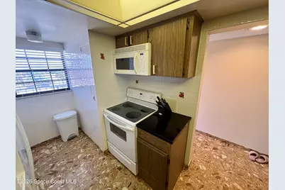 4100 Ocean Beach Boulevard #406, Cocoa Beach, FL 32931 - Photo 5
